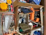 a box full of assorted items sitting on the floor