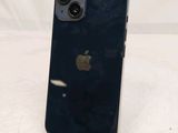 an apple iphone is sitting on top of a stand on a table
