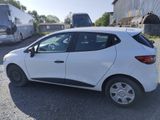 a white car that is parked in the parking lot