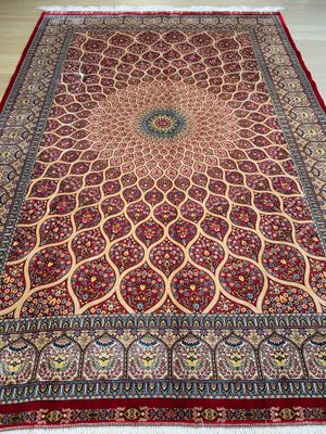 Tapis Iran centre médaillon fond rouge 225 x 150