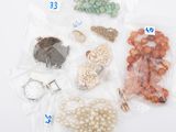 many different types of jewelry in the bag