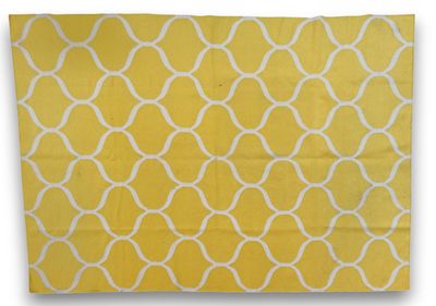 a close up of a yellow and white rug on a white background