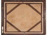 an old wooden frame with a brown and tan pattern on it