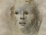 painting of a woman ' s face on a piece of paper