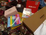 many items that are sitting on a bed together