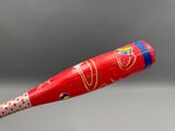 a baseball bat with a design on it flying in the air