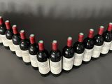 a group of bottles of wine sitting on top of a table