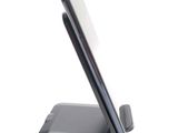 a cell phone that is sitting on top of a stand