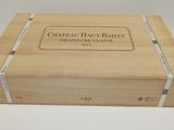 an image of a wooden box with a label that says chateau haut bally grand cru classe