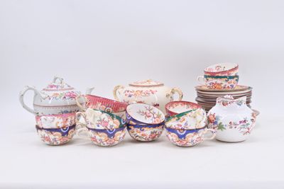many different types of teapots and saucers on the table