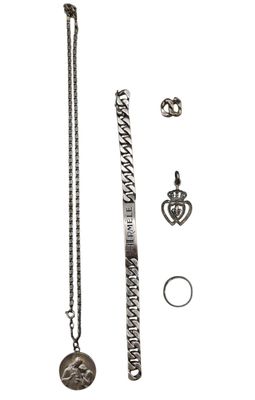 an image of a necklace, bracelet, and ring with a crown on it