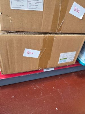 two boxes that are stacked on top of each other