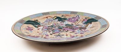 a plate with a picture of birds and flowers on it