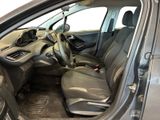 the interior of a car with the door open showing the driver ' s seat