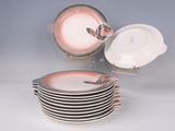 a stack of plates that are sitting on a table