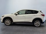 a picture of a white mazda cx - 5 suv