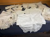 a table with a bunch of white laces on it