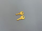 two keys that are sitting on top of each other