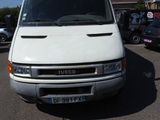 a white van that is parked in a parking lot