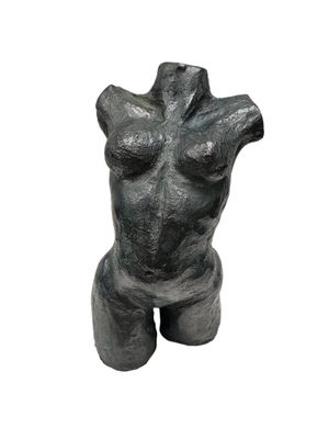 sculpture of a female torso on a white background
