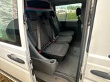 a white van with two seats in the back of it