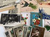 many old postcards of different styles and colors