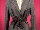 an image of a woman ' s jacket on a mannequin