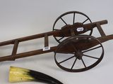 a wooden cart with a horn and a hornhorn