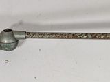 a close up of a screw and a bolt on a wall
