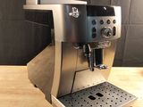 an image of a coffee machine on a wooden table
