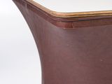 a brown and white table with a white top
