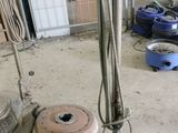 a machine that is sitting on the floor in the garage