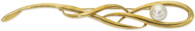 a gold brooch with a pearl in the middle