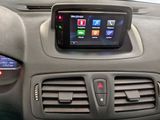 the dashboard of a car with a display of apps on the screen