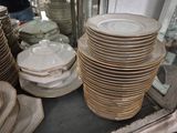 a lot of plates stacked on top of each other