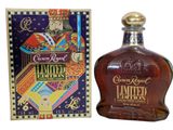 a close up of a bottle of liquor next to a box
