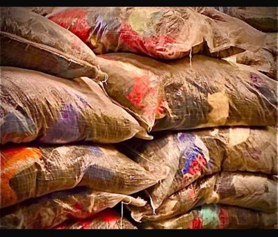many bags of sand sitting on top of each other