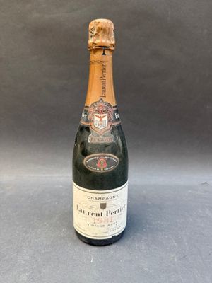 an image of a bottle of champagne sitting on a table