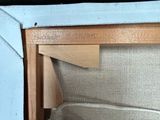 a close up view of a kitchen cabinet with a microwave in it