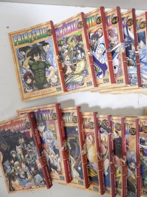 a lot of anime cards that are on a shelf