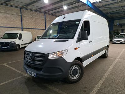 a white van that is parked in a parking lot