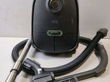 a vacuum and a cord on a table