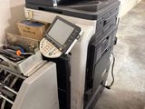 a pile of office equipment that is sitting on the floor
