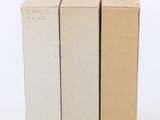 three cardboard boxes stacked on top of each other on a white surface