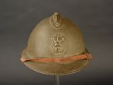 a helmet on a stand on a gray background
