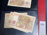 two different types of currency on display in a case