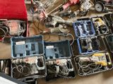 a lot of tools that are sitting on the floor