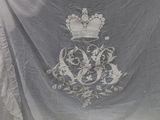 an image of a piece of cloth with a crown on it