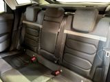 the back seats of a car are empty and the seats are empty