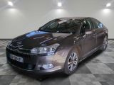 a picture of a car parked in a showroom